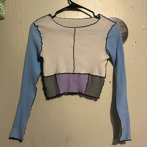 Medium cropped colorblock long sleeve with crimped black stitching